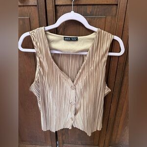 Women's khaki Pleated button up vest.